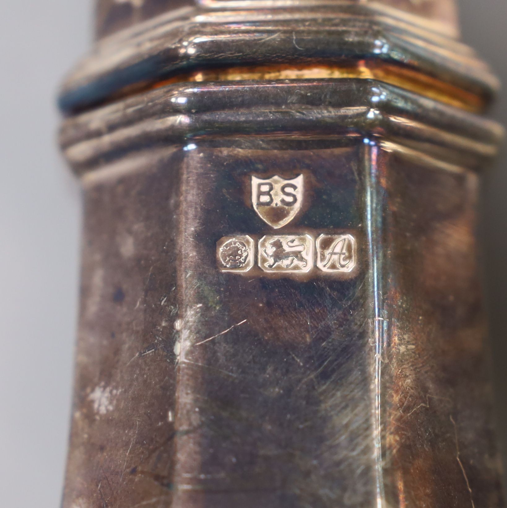 A George V silver baluster sugar caster, London, 1926, 18.5cm and a later silver octagonal sugar caster, 13.5oz.